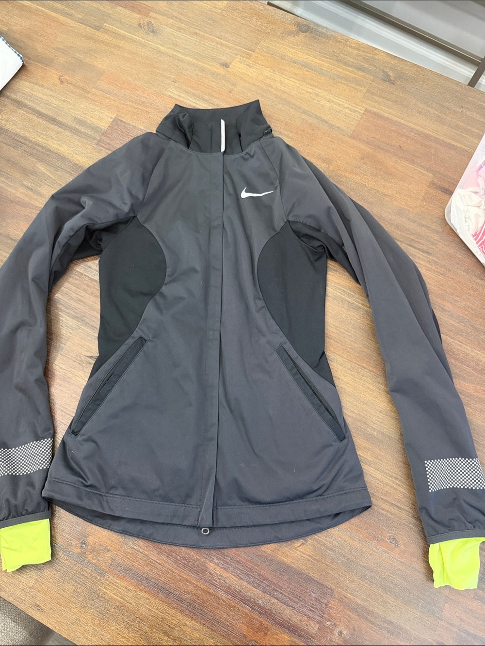 Nike Black Running Jacket with Neon Lime Cuff Accents